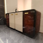 Curved Four-Door Sideboard with Quilted Upholstered Panels High-Gloss Burl Wood Veneer and Gold-Finish Metal Handles